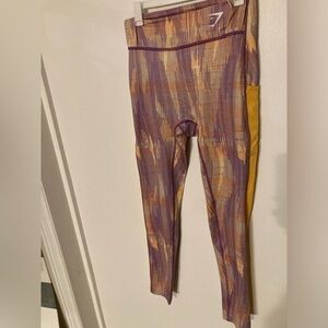 Gymshark sport leggings in orange print size small. NWOT